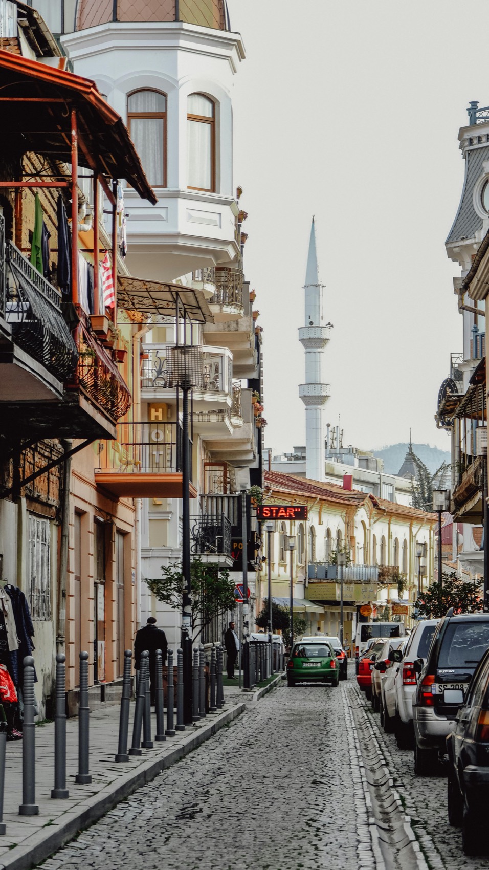 orta jame mosque minaret over a cobblestone street, batumi